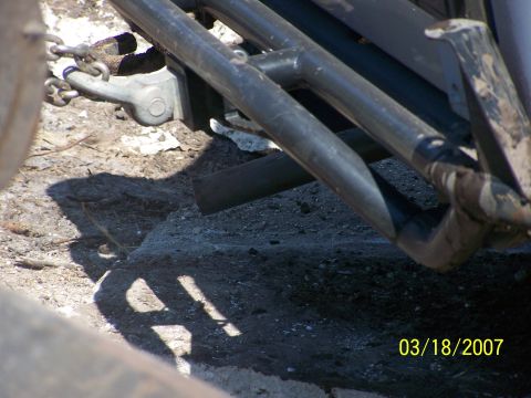 1989 Ford Bronco - A close-up view of a trailer hitch and chain, with a date stamp of 03/18/2007 and SuperMotors branding.