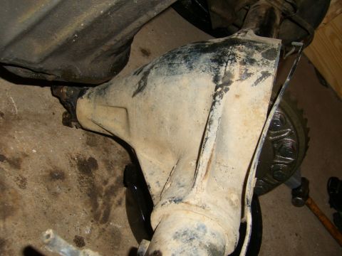 1994 Ford Bronco - This photo shows a close-up view of a heavily used rear axle assembly, likely undergoing maintenance or repair.