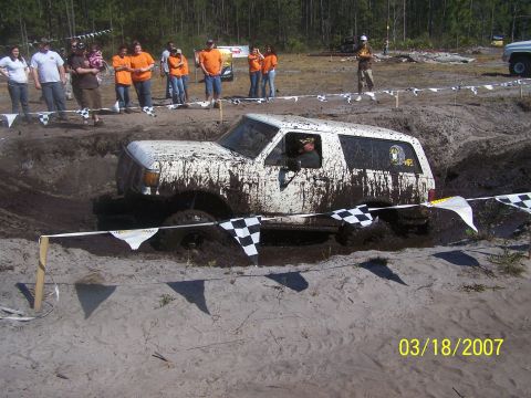 1989 Ford Bronco - A white 1989 Ford Bronco is stuck in a mud pit during an event on March 18, 2007.