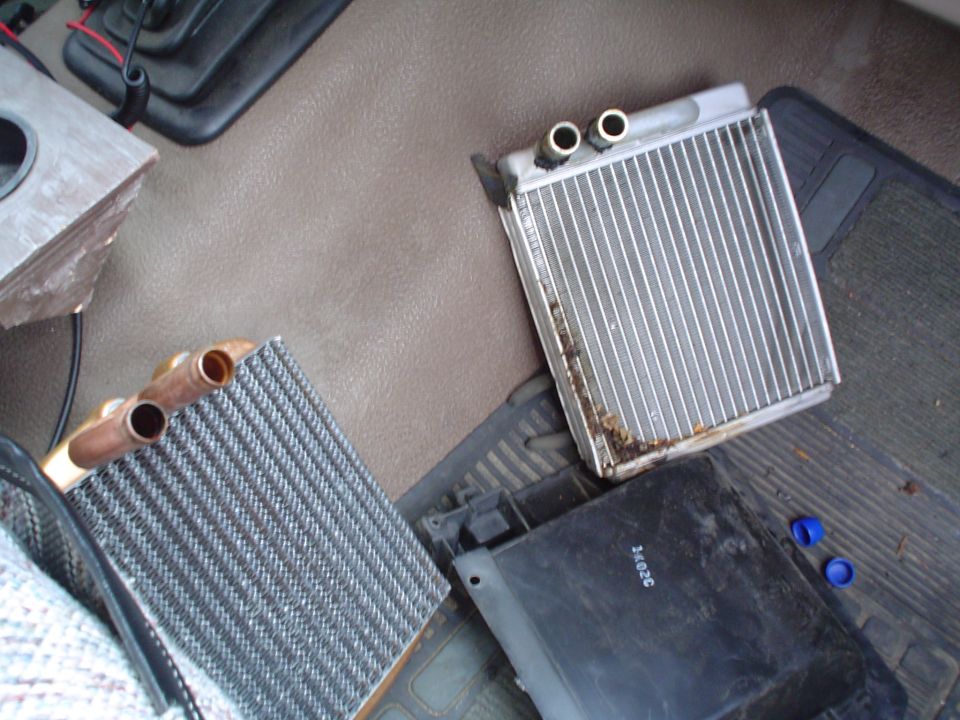 Here is the old heater core next to the new one.  Now just put the new one into the box, reattach the hoses on the outside, put the cover back on, hook up the cables and the wires and put the glove box back in and start the truck.  There should be no leaks, if there are none, then congratulations.