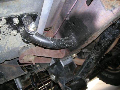 1985 Ford Bronco - drivers side front tie in...poly urethane bushing in between floor and down tube.