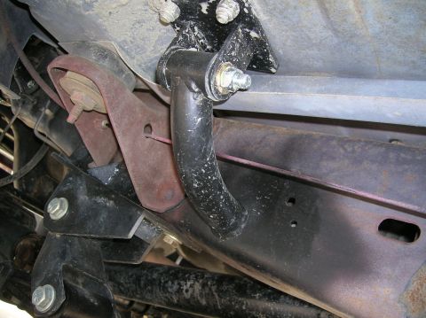 1985 Ford Bronco - Close-up of the undercarriage showing suspension hardware and frame components.