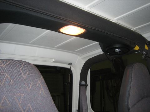 2001 Jeep Wrangler - The interior of a 2001 Jeep Wrangler is visible, including the headliner, dome light, and seats.