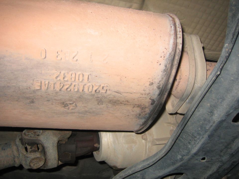Exhaust system part with part number 52019241AE stamped on it