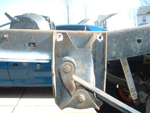1978 Chevrolet C/K Pickup - took 2 of the rivets out on each side. Need to go buy grade 8 bolts today... they came out easy.. 5 minutes for the 4 I did so far...