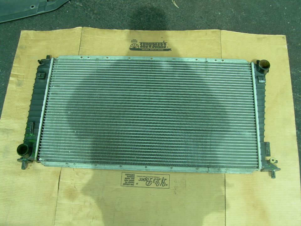 Radiator part on cardboard with text labels