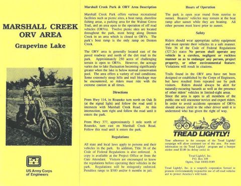 1978 Ford Bronco - A rider is on a dirt bike in an outdoor area.