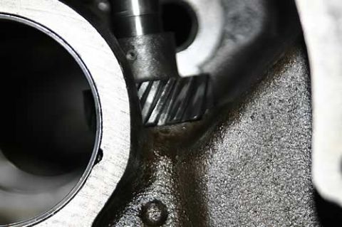 1972 Ford Ranchero - Detail of an engine component, possibly a gear within a block, with visible text 'SUPER MOTORS'.
