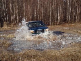1996 Ford Bronco - This 1992 Ford Bronco is navigating through a watery obstacle course.