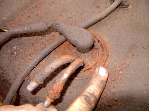 1986 Ford Bronco - Ugly looking 86' in-tank fuel pump/sending unit. It's older than the old tank, which I stuck in new in 99'. Gotta save the unit and sacrifi…