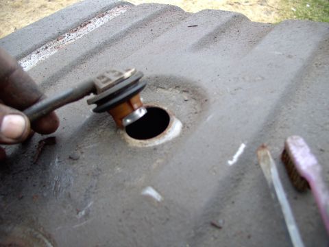 1986 Ford Bronco - The vent valve popped out very easily (Thank goodness). So many people bust these things removing them.