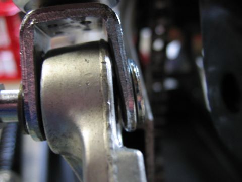1985 Ford LTD Crown Victoria - A detailed view of a metal bracket assembly, showing its components and construction.
