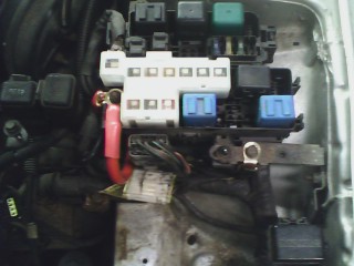 1993 Ford Probe - This image shows a detailed view of an automotive fuse box and its associated wiring components.