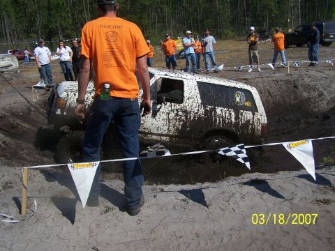 1989 Ford Bronco - A white SUV is stuck in a muddy ditch during an event on March 18, 2007.