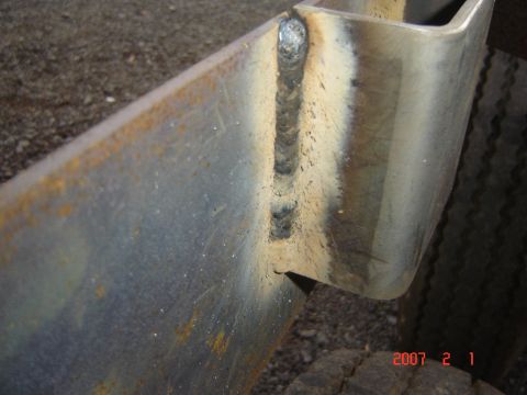 1993 Ford Bronco - Welded metal frame section with visible weld marks and rust. Supermotors.net watermark present.