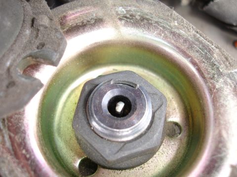 1993 Ford Taurus - Detail of a mechanical component, likely a fastener or adjustment mechanism.