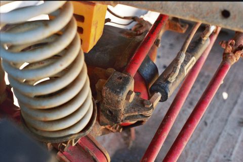 1978 Ford Bronco - Suspension components including a coil spring and shock absorber are visible.