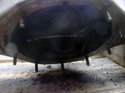 1979 Ford Bronco - Close-up view of a rear axle housing, showing its internal structure and mounting bolts.