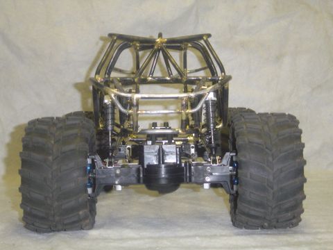 1993 Ford Bronco - RC rock crawler chassis with large tires and exposed suspension components.