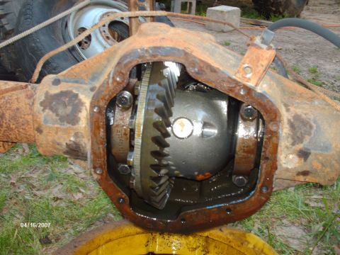 1990 Ford F-150 - Differential housing opened to reveal internal gears and components. A date stamp is visible in the lower left corner.