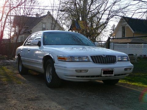 1997 Mercury Grand Marquis - Front view of a white 1997 Mercury Grand Marquis sedan.