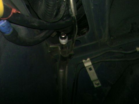 1978 Ford Mustang II - A view of the undercarriage, showing various hoses and mounting hardware.