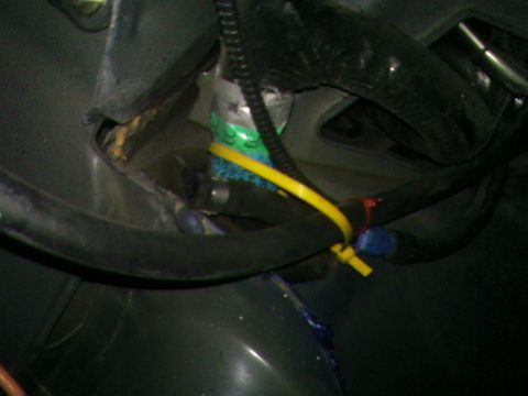 1978 Ford Mustang II - A close-up view of a vehicle's internal wiring and components, secured with zip ties.