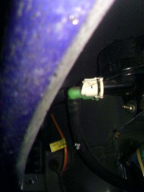 1978 Ford Mustang II - Automotive electrical connector with visible wiring and a yellow label.