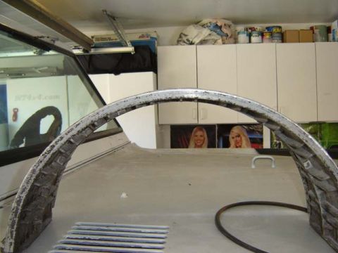 1971 Ford Bronco - This image shows a close-up of a vehicle's interior structural part, possibly a roll bar or windshield frame.
