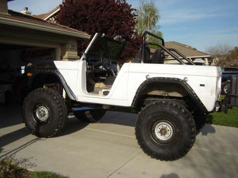 1971 Ford Bronco - This 1971 Ford Bronco is undergoing modifications, a roll cage and oversized tires.