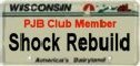 1978 Ford Bronco - License plate frame from Wisconsin, advertising 'Shock Rebuild' and 'PJB Club Member'.