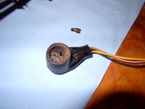 1986 Ford Bronco - Here's a shot of the empty socket and the broken off clip lying beside it. I wouldn't go to the trouble, but these are just NLA at the stea…