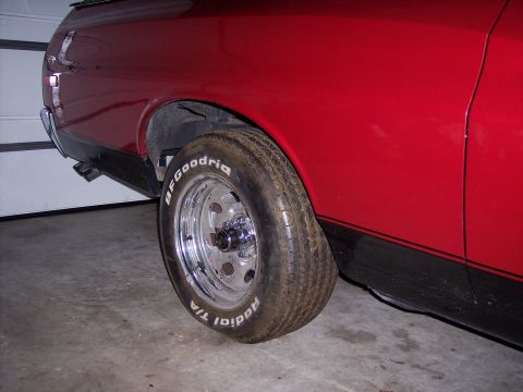 1972 Ford Ranchero - Close-up of the rear wheel and side panel of a 1972 Ford Ranchero.