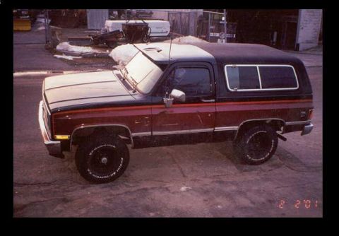 1979 Ford Bronco - This SUV, likely from the mid-1970s, is parked outdoors on a paved surface.