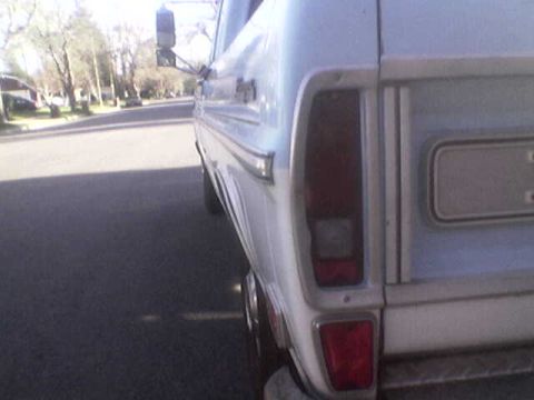 1969 Ford F-250 - Rear view of a 1967 Ford F-series pickup truck, showing the taillight and side panel.