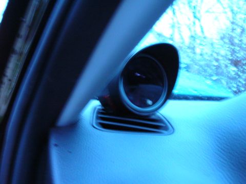 1994 Ford Probe - Interior shot of an aftermarket gauge mounted on the dashboard.