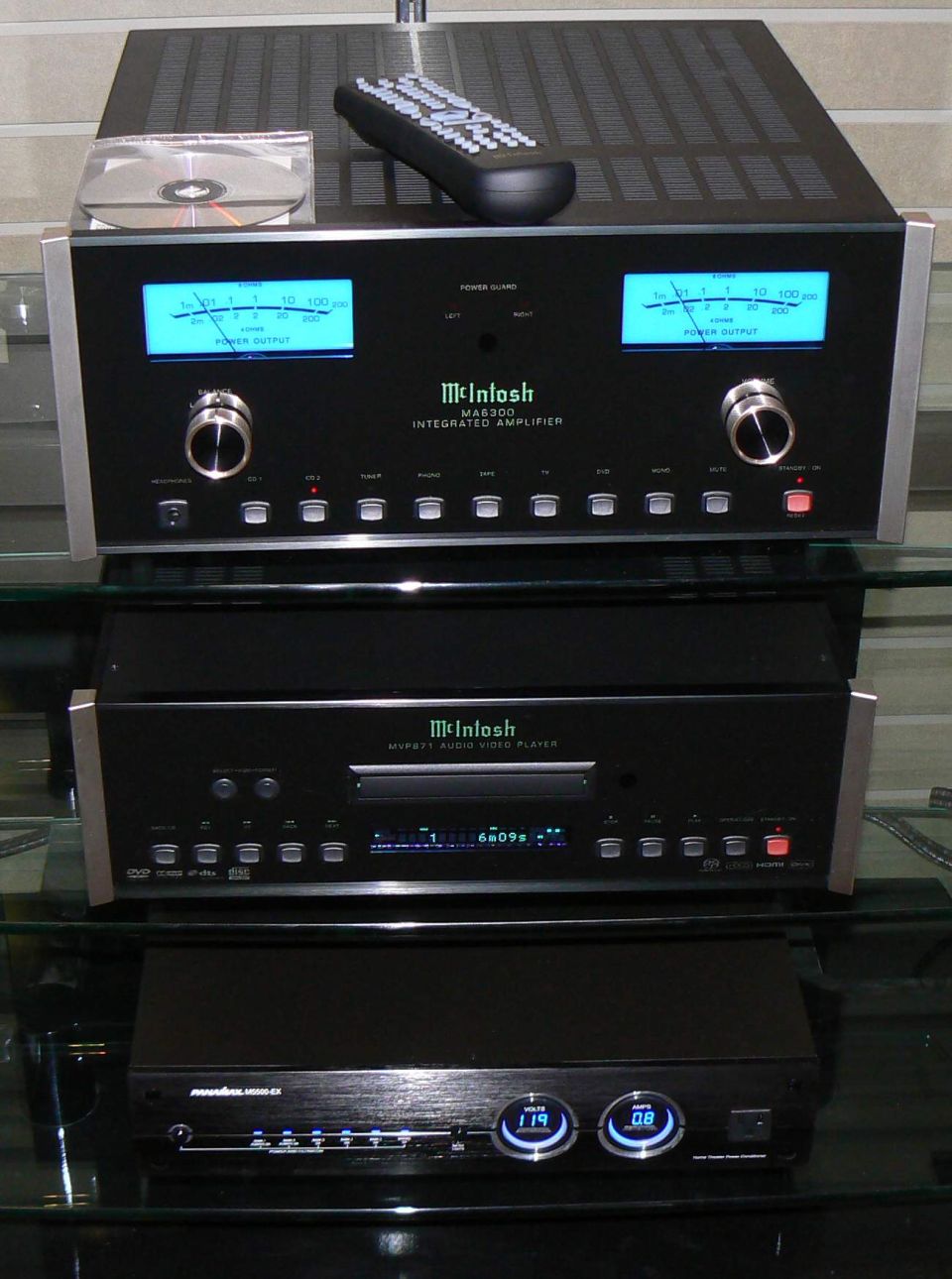 McIntosh MA6300 integrated amplifier with blue meters and a McIntosh MVP831 audio video player below