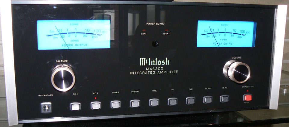 Black McIntosh MA6300 integrated amplifier with two blue power output meters