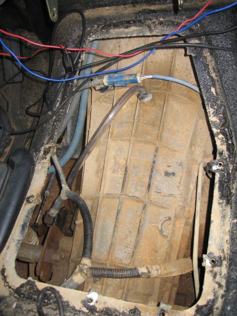 1996 Ford Bronco - Top of E4OD with extended breather line. Had to grind it a little for the tube to fit.