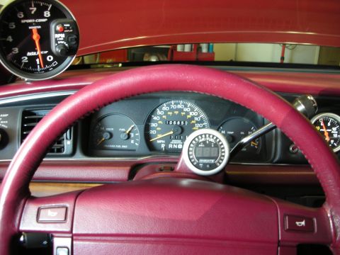 1992 Ford Crown Victoria - Custom gauges are installed on the dashboard of this vehicle.