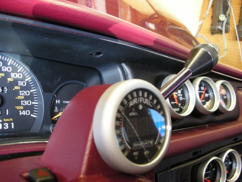 1992 Ford Crown Victoria - Interior view of a 1992 Ford Crown Victoria dashboard, showing various gauges and the gear shifter.