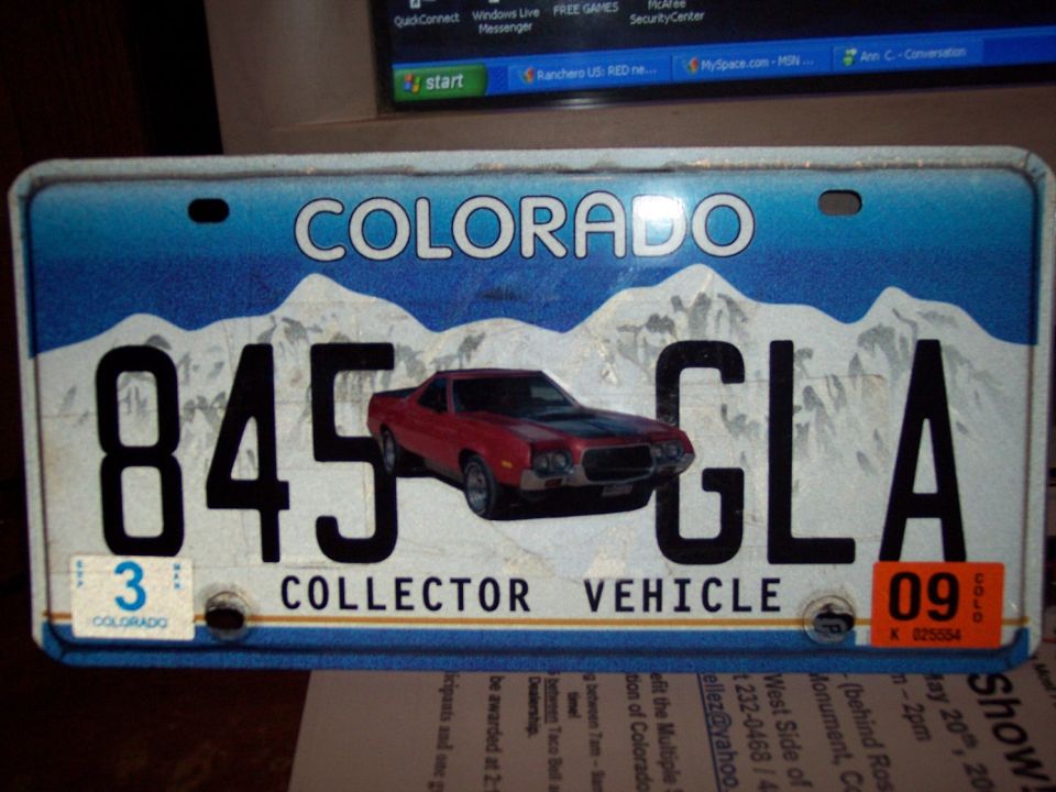 Colorado license plate with "845 GLA" and "COLLECTOR VEHICLE" text, a graphic of a red car