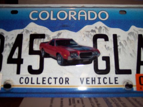 1972 Ford Ranchero - A Colorado license plate features a graphic of a red 1972 Ford Ranchero with racing stripes.