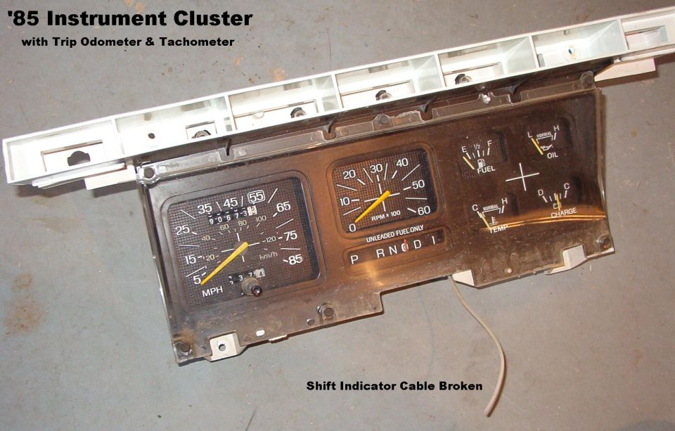 Tach & Trip Cluster from '85 F150

Probably fits all '80-86 Bronco & F-series (gas)

--------------------------------------------------------------------------------

TSB 89-02-07 Speedometer Accuracy

Publication Date: JANUARY 25, 1989

FORD:  1989 and prior ALL CAR LINES
LINCOLN-MERCURY:  1989 and prior ALL CAR LINES
LIGHT TRUCK:  1989 and prior ALL TRUCK LINES
MEDIUM/HEAVY TRUCK:  1989 and prior ALL MEDIUM/HEAVY TRUCK LINES

ISSUE: The accuracy of speedometer/odometer readings may be influenced by several vehicle components or systems. The information in this TSB article is intended to assist technicians in speedometer/odometer concern diagnosis.

ACTION: Use the following supplemental information to assist in speedometer/odometer diagnostics.

OPERATION: A mechanical analog speedometer displays vehicle speed and the odometer displays total distance traveled. The speedometer/odometer assembly is cable driven by either a transmission or a transaxle. All speedometer/odometer assemblies, except for police vehicles are the same with respect to the speed accuracy tolerance used during calibration. The odometer gear ratio is fixed so that all are identical and have no error in the speedometer head.

Electronic digital operation is similar. It could use a drive cable or a speed sensor to drive the speedometer/odometer. An electronic signal is sent from a speed sensor to the digital speedometer/odometer assembly. The speed sensor is driven by a transmission or a transaxle, similar to a cable.

Several areas of concern that may affect speedometer/odometer readings are tires, axle gear ratio and speedometer/odometer drive and driven gears.

TIRES: Improper tire rolling radius and inflation pressure, temperature and size may contribute to inaccurate system readings. System accuracy testing should be performed after the tires are set at the correct pressure as shown on the safety compliance certification label. The tire should be warmed for a short period. Best results are obtained on smooth, dry pavement while driving at a constant speed within the posted speed limit.

AXLE/TRANSAXLE RATIO: The gear ratio of the rear axle or the final drive ratio of the transaxle must be known to select or check if the proper speedometer/odometer drive and driven gears are present. Various gear ratios are available, but usually are not a concern when dealing with speedometer/odometer concerns unless the gear ratio has been changed.
WARNING:  NEVER CORRECT SPEEDOMETER READINGS BY CHANGING GEARS UNLESS THE ODOMETER IS ALSO OFF.  

DRIVE/DRIVEN GEARS: The speedometer/odometer drive gear is located inside the transmission, transaxle or transfer case and is not easily accessed for change. The driven gear rotates the speedometer cable. Rear wheel drive vehicles have several driven gears with various numbers of teeth available to correct input to the speedometer/odometer head. Front wheel drive vehicles generally do not offer different gears for correction. 

GENERAL DESCRIPTION: The maximum allowable odometer system accuracy error is ± 3.75% of the actual distance traveled. Ford Motor vehicles are well within those limits.

The speed indication is biased high, except on police vehicles with certified calibration speedometers/odometers. As a general rule, the indicated speed is equal to or greater than the actual speed. This is intended to protect the consumer against violating speed laws. Most customer concerns are related to speedometers reading too high at true speeds between 50 MPH and 65 MPH (80 - 105 Km/h). At that speed range, the worst case errors may indicate a speed that is 10% greater than true speed.

The speedometer head is an instrument which processes information sent to it by the rotating speedometer cable. If the system components send the wrong number of revolution per mile to the speedometer head, an inaccurate speed reading and amount of distanced traveled will be displayed. Since there is no error in the fixed gear ratio of the speedometer head odometer, start by checking the accuracy of the odometer even if the customer concern indicates a speed accuracy problem. Odometer accuracy can be checked by using roads established at mile increments or a known local course. If roads with mile markers are used, a five mile stretch is recommended to allow for inaccuracies. If an error is greater than 3.75%, a change to the transmission drive/driven gear selection, tire size, or tire inflation may need attention. The odometer should be checked again to verify any corrective action. If the indicated speed error exceeds 10% between 50 MPH and 60 MPH (80 - 105 Km/h), replace the speedometer/odometer assembly. Vehicles with transfer cases that have fluctuating readings may be due to slippage of drive gears, parts not splined or loose yoke nuts.

If the vehicle has speed control, the speed accuracy can be checked using the verified odometer vs. time. The formula is as follows: 
3600 divded by TIME (seconds to cover one mile) = TRUE MPH(Km/h)

EXAMPLES:
60 MPH (96 Km/h) requires 60 seconds to cover one mile
55 MPH (88 Km/h) requires 65 and 3/4 seconds to cover one mile
50 MPH (80 Km/h) requires 72 seconds to cover one mile

SUPERSEDES: 84-14-06
WARRANTY STATUS: INFORMATION ONLY