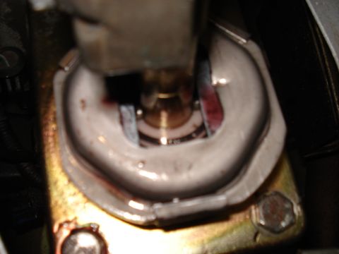 1998 Ford Taurus - Close-up view of the automatic transmission shifter linkage mechanism.
