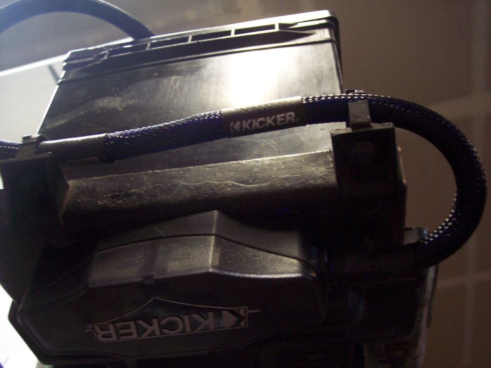 Kicker amplifier with braided power wire connected