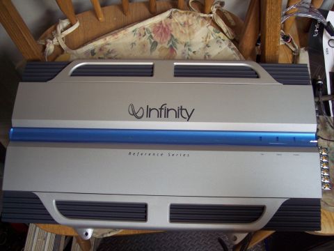 1995 Ford Probe - Infinity car audio amplifier with blue accent stripe and 'Reference Series' label.