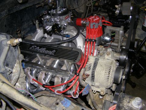 1993 Ford Bronco - Close-up view of an engine bay, showing various aftermarket components and wiring.