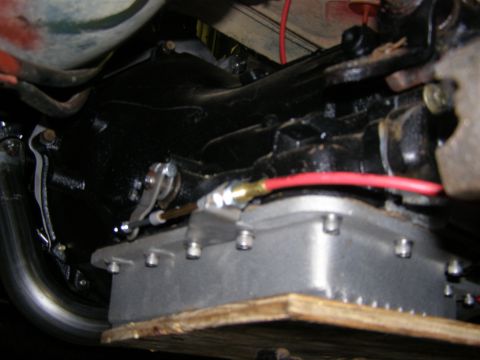 1993 Ford Bronco - Transmission pan and linkage detail, likely from an older vehicle.