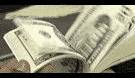 1986 Ford Crown Victoria LTD - A close-up shot of several hundred dollar bills, suggesting wealth or a transaction.